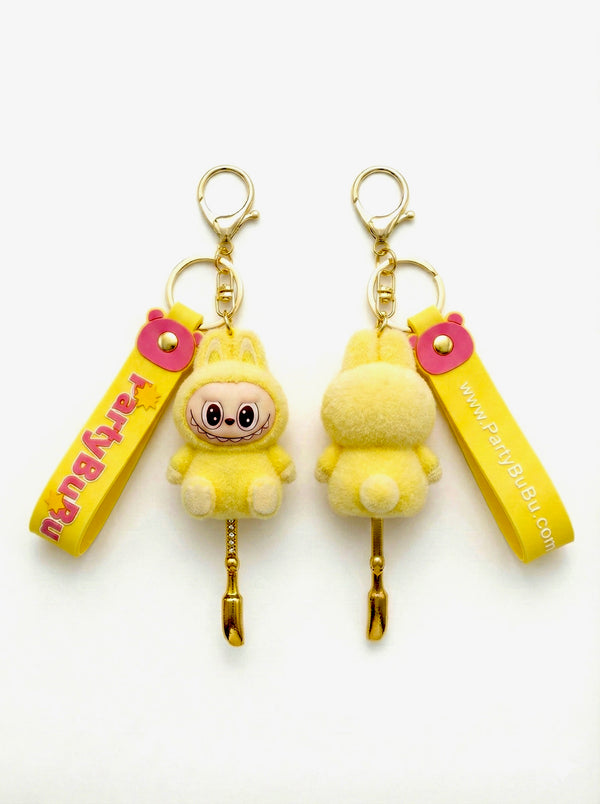 Yellow Bubu Keychain Spoon sitting down